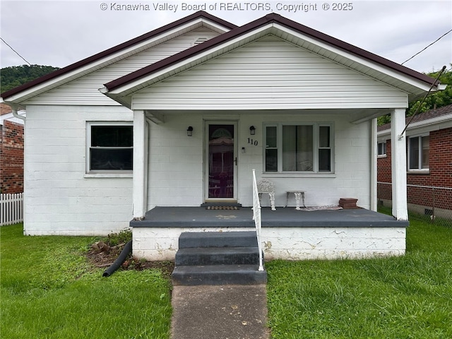 110 3rd Ave, Glasgow, WV 25086 - view of front of house with a porch and concrete block siding