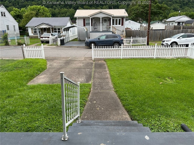 110 3rd Ave, Glasgow, WV 25086 - view of yard with covered porch and driveway