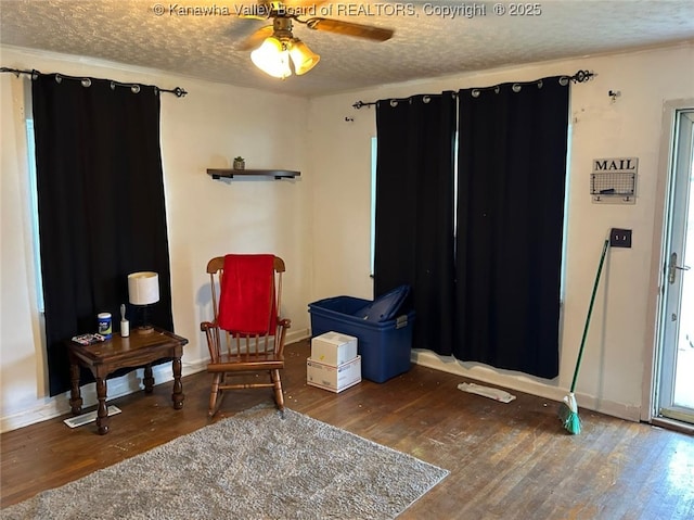 110 3rd Ave, Glasgow, WV 25086 - sitting room with wood finished floors, a textured ceiling, baseboards, and ceiling fan