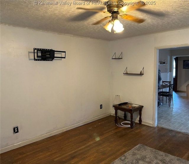 110 3rd Ave, Glasgow, WV 25086 - spare room featuring wood finished floors, a textured ceiling, ceiling fan, and baseboards