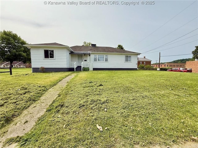 300 Sycamore St, Ravenswood, WV 26164 - back of house with a lawn