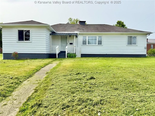 300 Sycamore St, Ravenswood, WV 26164 - rear view of property featuring a yard