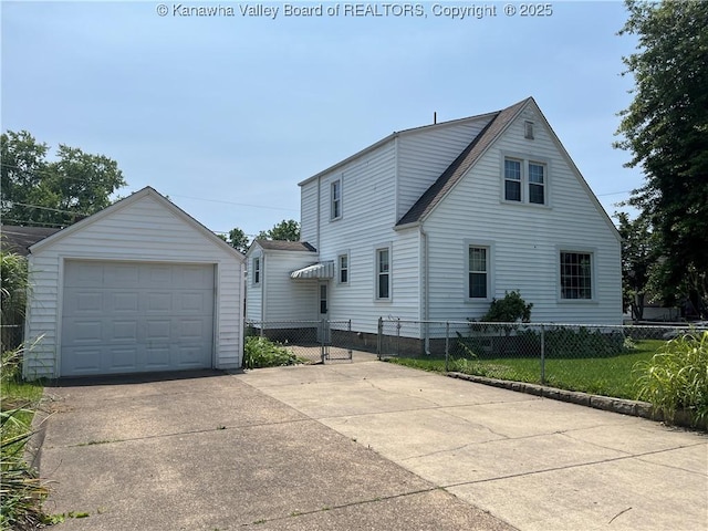 618 Hunt Ave, Charleston, WV 25302 - view of home's exterior featuring driveway, a garage, and an outbuilding