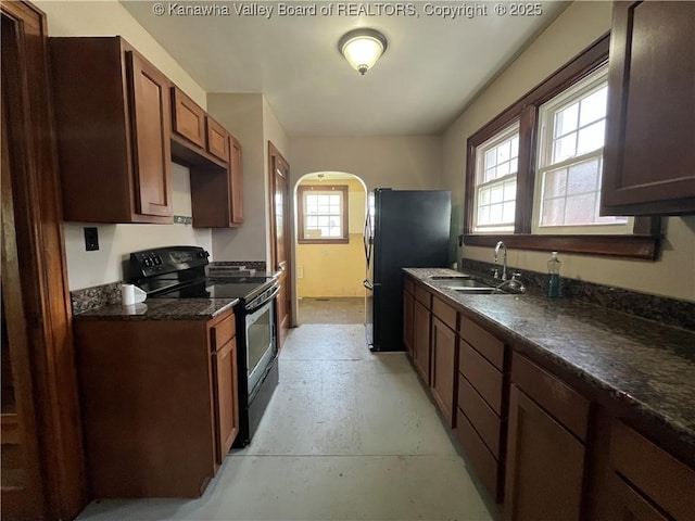 618 Hunt Ave, Charleston, WV 25302 - kitchen featuring black appliances, a sink, plenty of natural light, and concrete floors