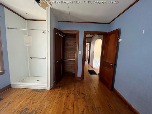 618 Hunt Ave, Charleston, WV 25302 - hallway with crown molding, hardwood / wood-style floors, arched walkways, and baseboards