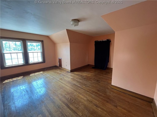 618 Hunt Ave, Charleston, WV 25302 - bonus room with wood finished floors, vaulted ceiling, radiator, and baseboards