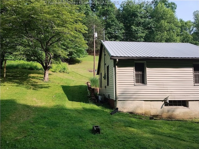 64 Haystack Ln, Charleston, WV 25311 - view of property exterior featuring a yard and metal roof