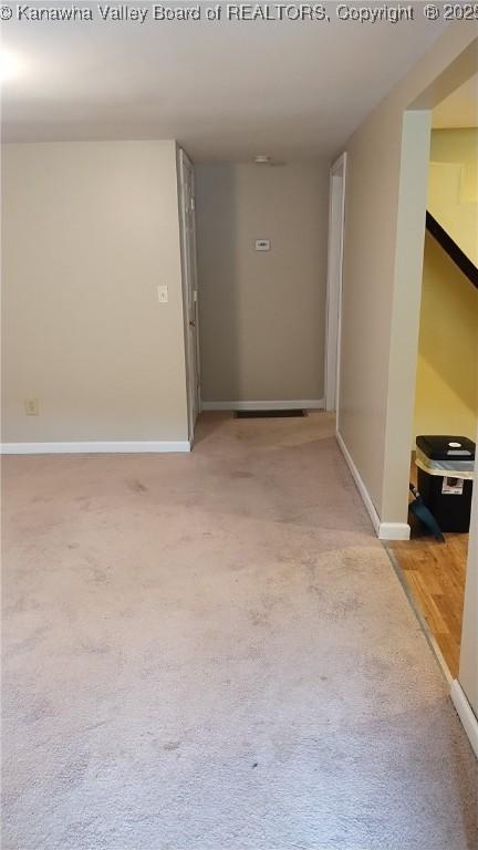 64 Haystack Ln, Charleston, WV 25311 - hall featuring baseboards and light carpet