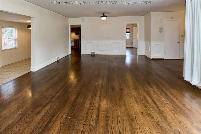 4302 Virginia Ave, Charleston, WV 25304 - spare room with healthy amount of natural light, dark wood-type flooring, and wainscoting
