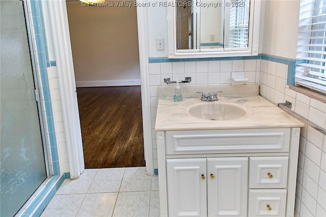 4302 Virginia Ave, Charleston, WV 25304 - bathroom with vanity, a shower stall, and wood finished floors