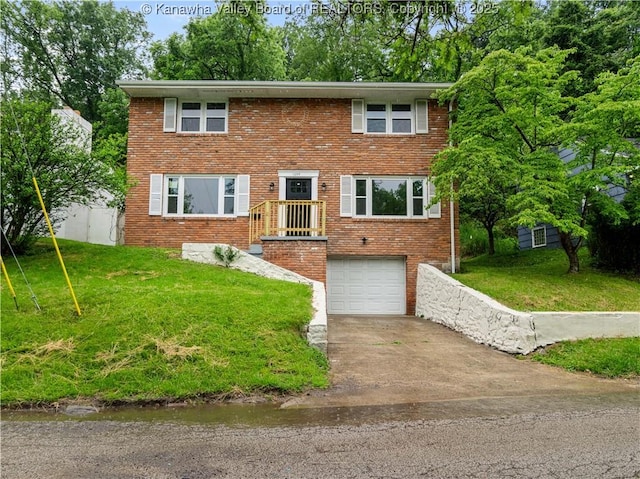 1255 Park Ave, Charleston, WV 25302 - view of front of home featuring a garage, concrete driveway, and brick siding