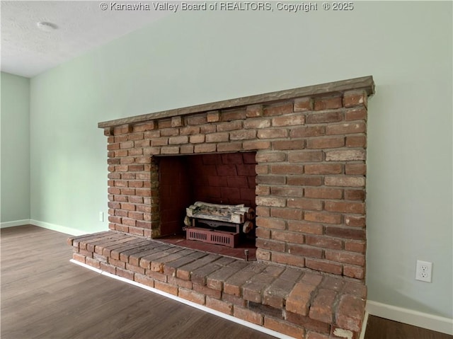 1255 Park Ave, Charleston, WV 25302 - detailed view of baseboards, wood finished floors, and a textured ceiling