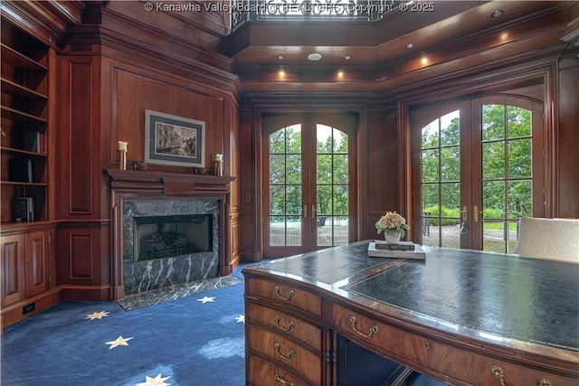 230 Quarry Rdg E, Charleston, WV 25304 - home office featuring french doors, a high end fireplace, dark carpet, built in features, and wood walls