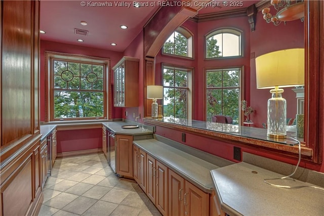230 Quarry Rdg E, Charleston, WV 25304 - kitchen with light tile patterned floors, recessed lighting, baseboards, and stainless steel dishwasher