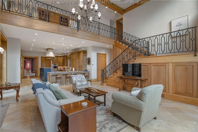 230 Quarry Rdg E, Charleston, WV 25304 - living room with a high ceiling, a chandelier, stairway, light tile patterned floors, and recessed lighting