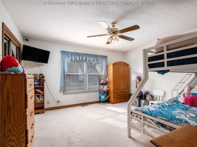 123 Brooke St, Culloden, WV 25510 - bedroom featuring light carpet, baseboards, a textured ceiling, and a ceiling fan