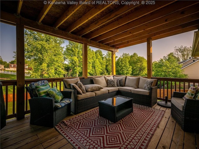 123 Brooke St, Culloden, WV 25510 - deck at dusk with an outdoor hangout area