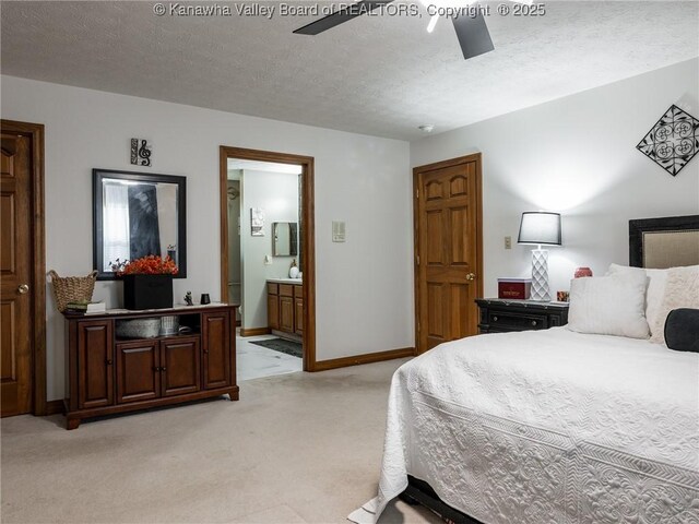 123 Brooke St, Culloden, WV 25510 - bedroom featuring light colored carpet, ensuite bathroom, a textured ceiling, baseboards, and ceiling fan