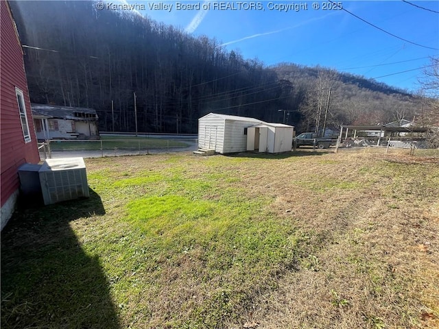 57 Barrett Cir, Wharton, WV 25208 - view of yard with central AC and a mountain view