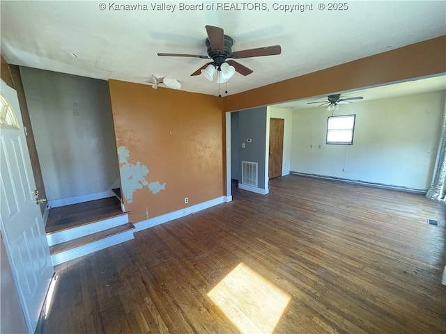 57 Barrett Cir, Wharton, WV 25208 - spare room with wood finished floors, a ceiling fan, and baseboards