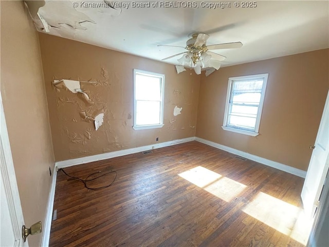 57 Barrett Cir, Wharton, WV 25208 - unfurnished room with healthy amount of natural light, wood finished floors, baseboards, and ceiling fan