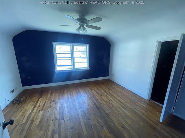 57 Barrett Cir, Wharton, WV 25208 - additional living space with lofted ceiling, wood finished floors, ceiling fan, and baseboards
