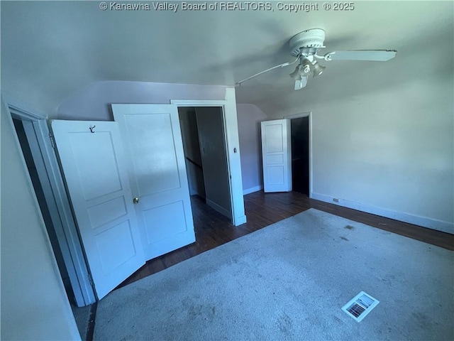 57 Barrett Cir, Wharton, WV 25208 - unfurnished bedroom with wood finished floors, baseboards, a closet, lofted ceiling, and ceiling fan