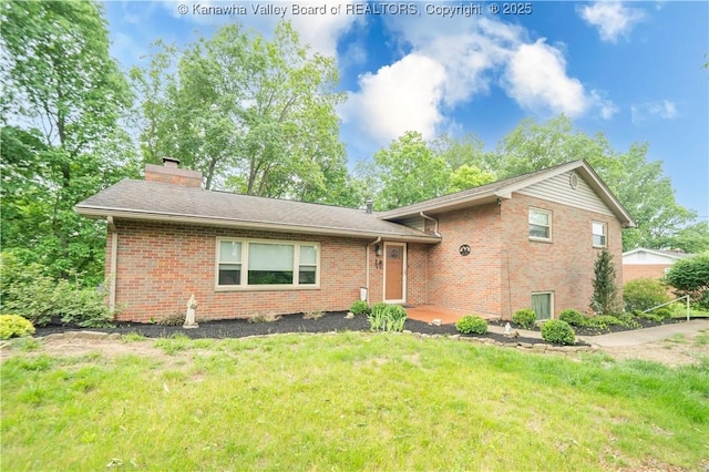 868 Alta Rd, Charleston, WV 25314 - split level home with brick siding, a front lawn, and a chimney