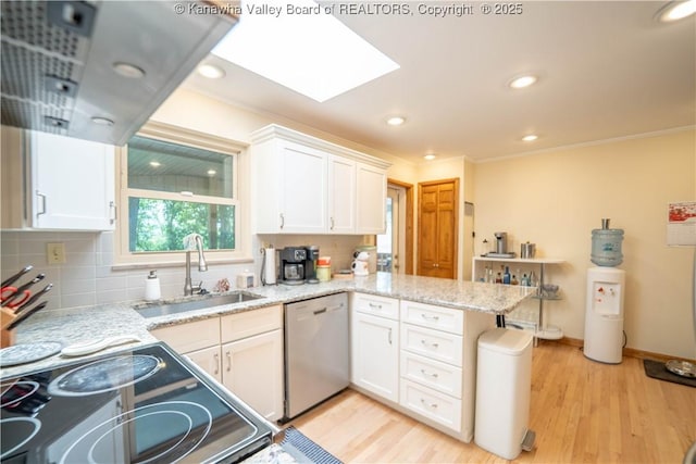 868 Alta Rd, Charleston, WV 25314 - kitchen featuring dishwasher, a sink, a peninsula, light wood-style floors, and crown molding