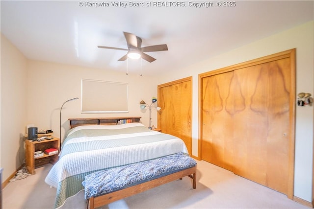 868 Alta Rd, Charleston, WV 25314 - bedroom with carpet flooring, two closets, and a ceiling fan