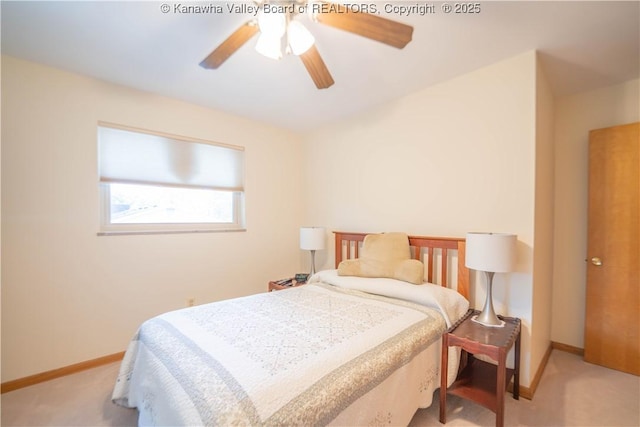 868 Alta Rd, Charleston, WV 25314 - bedroom with light colored carpet, baseboards, and a ceiling fan