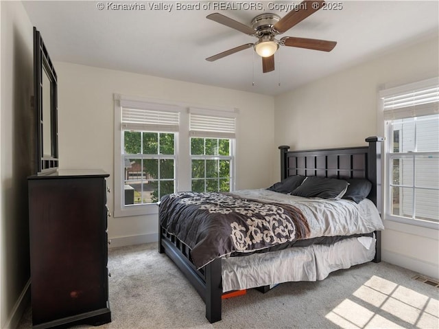 2116 21st St, Nitro, WV 25143 - bedroom featuring baseboards, carpet floors, and ceiling fan