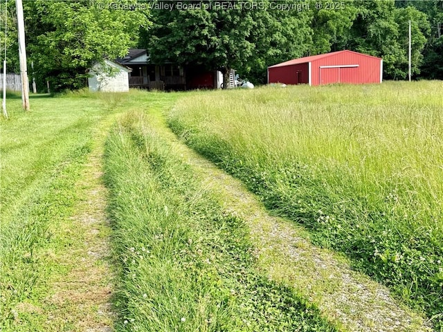 3112 Cicerone Rd, Charleston, WV 25320 - view of yard featuring an outbuilding and a pole building