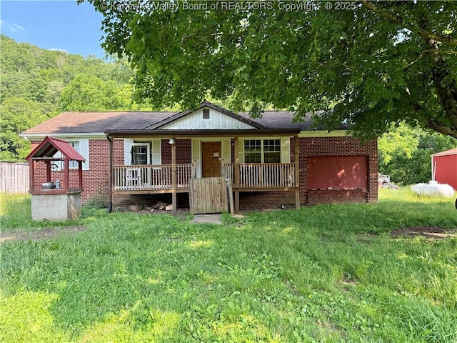 3112 Cicerone Rd, Charleston, WV 25320 - ranch-style house with covered porch, brick siding, and an attached garage