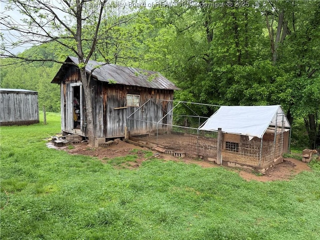 3112 Cicerone Rd, Charleston, WV 25320 - view of poultry coop with a yard and a wooded view