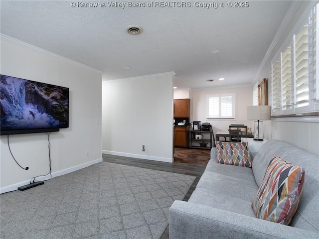 1911 Washington Ave, Saint Albans, WV 25177 - living area featuring crown molding, recessed lighting, baseboards, and dark wood-style flooring