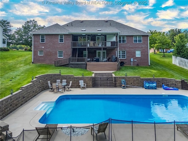 90 Brooke St, Culloden, WV 25510 - view of pool featuring a patio, a lawn, stairs, a wooden deck, and outdoor dining space