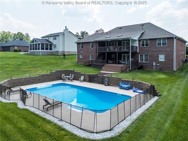 90 Brooke St, Culloden, WV 25510 - view of swimming pool featuring a wooden deck, stairway, central air condition unit, a patio area, and a sunroom