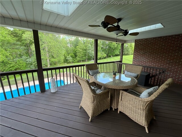90 Brooke St, Culloden, WV 25510 - wooden deck with ceiling fan and outdoor dining area