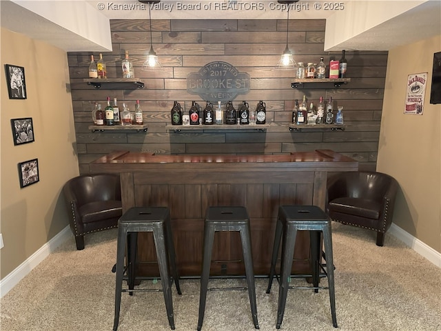90 Brooke St, Culloden, WV 25510 - indoor dry bar with carpet, baseboards, and wood walls