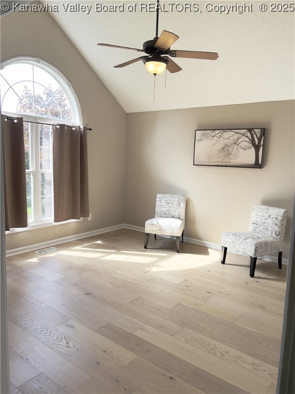 90 Brooke St, Culloden, WV 25510 - unfurnished room featuring vaulted ceiling, hardwood / wood-style flooring, baseboards, and a ceiling fan