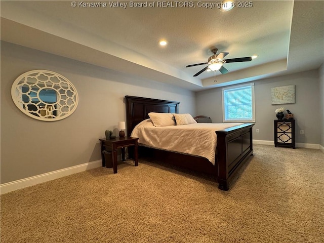 90 Brooke St, Culloden, WV 25510 - bedroom featuring baseboards, a tray ceiling, light colored carpet, recessed lighting, and a ceiling fan