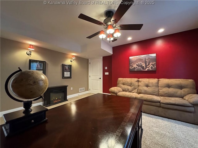 90 Brooke St, Culloden, WV 25510 - living area featuring ceiling fan, recessed lighting, baseboards, and a glass covered fireplace