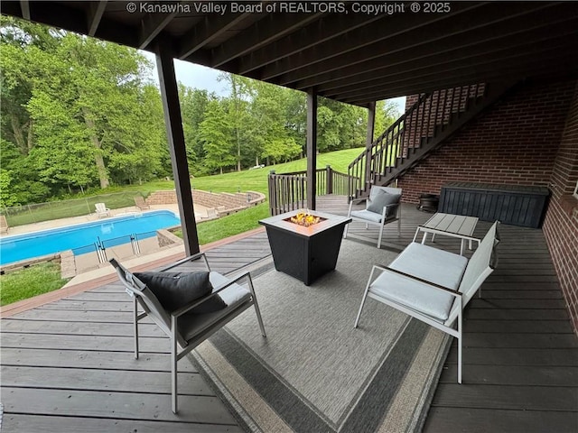 90 Brooke St, Culloden, WV 25510 - deck with a fire pit, stairs, and a yard