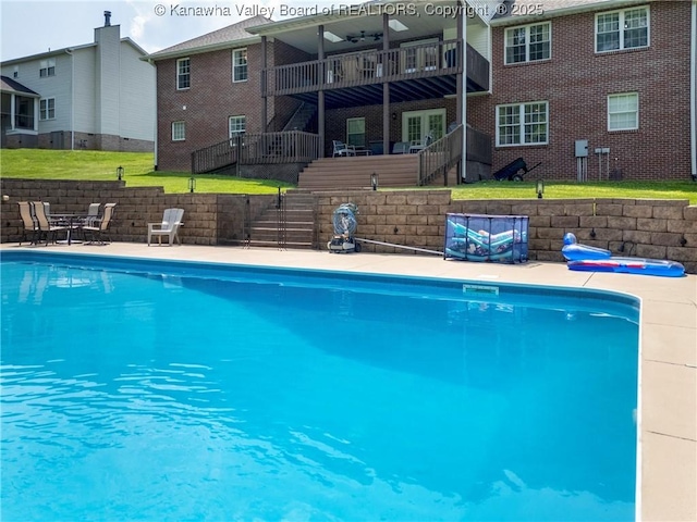 90 Brooke St, Culloden, WV 25510 - view of swimming pool featuring stairs and a patio