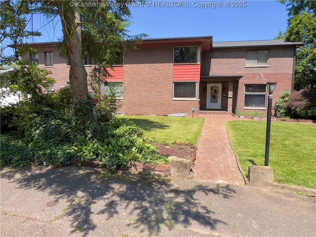 3915 Virginia Ave SE, Charleston, WV 25304 - view of front of home with brick siding and a front lawn