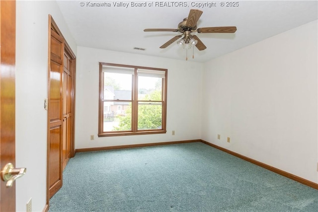 112 Willowood Cir, Hurricane, WV 25526 - unfurnished bedroom featuring carpet, baseboards, and ceiling fan