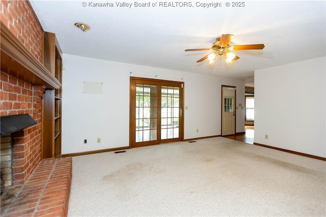 112 Willowood Cir, Hurricane, WV 25526 - unfurnished living room with a brick fireplace, carpet flooring, baseboards, and a ceiling fan