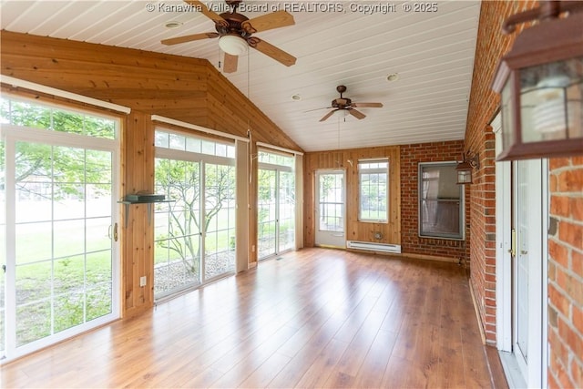 112 Willowood Cir, Hurricane, WV 25526 - unfurnished sunroom with vaulted ceiling and a baseboard heating unit