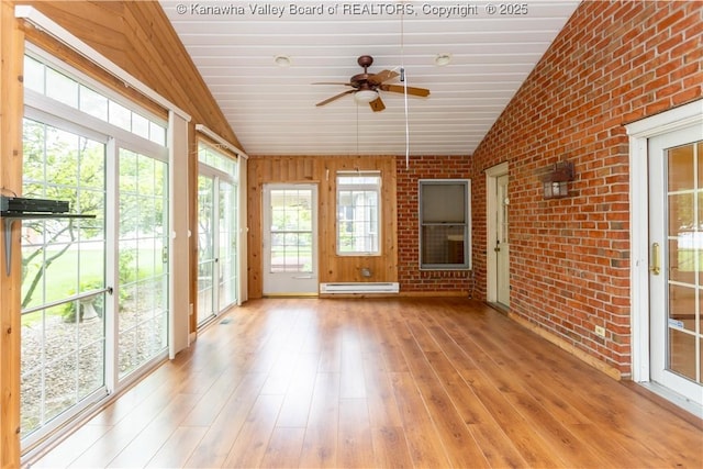 112 Willowood Cir, Hurricane, WV 25526 - unfurnished sunroom featuring a baseboard heating unit, brick wall, ceiling fan, and wood finished floors